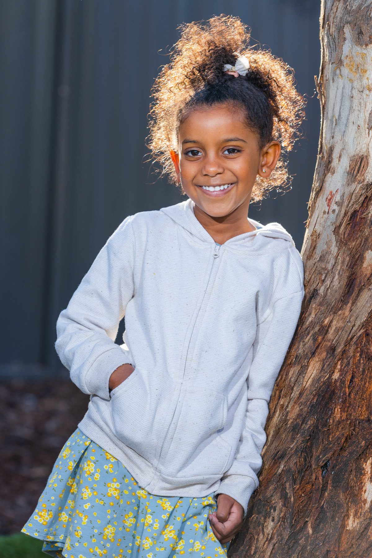 A kinder child's portrait, warm smile